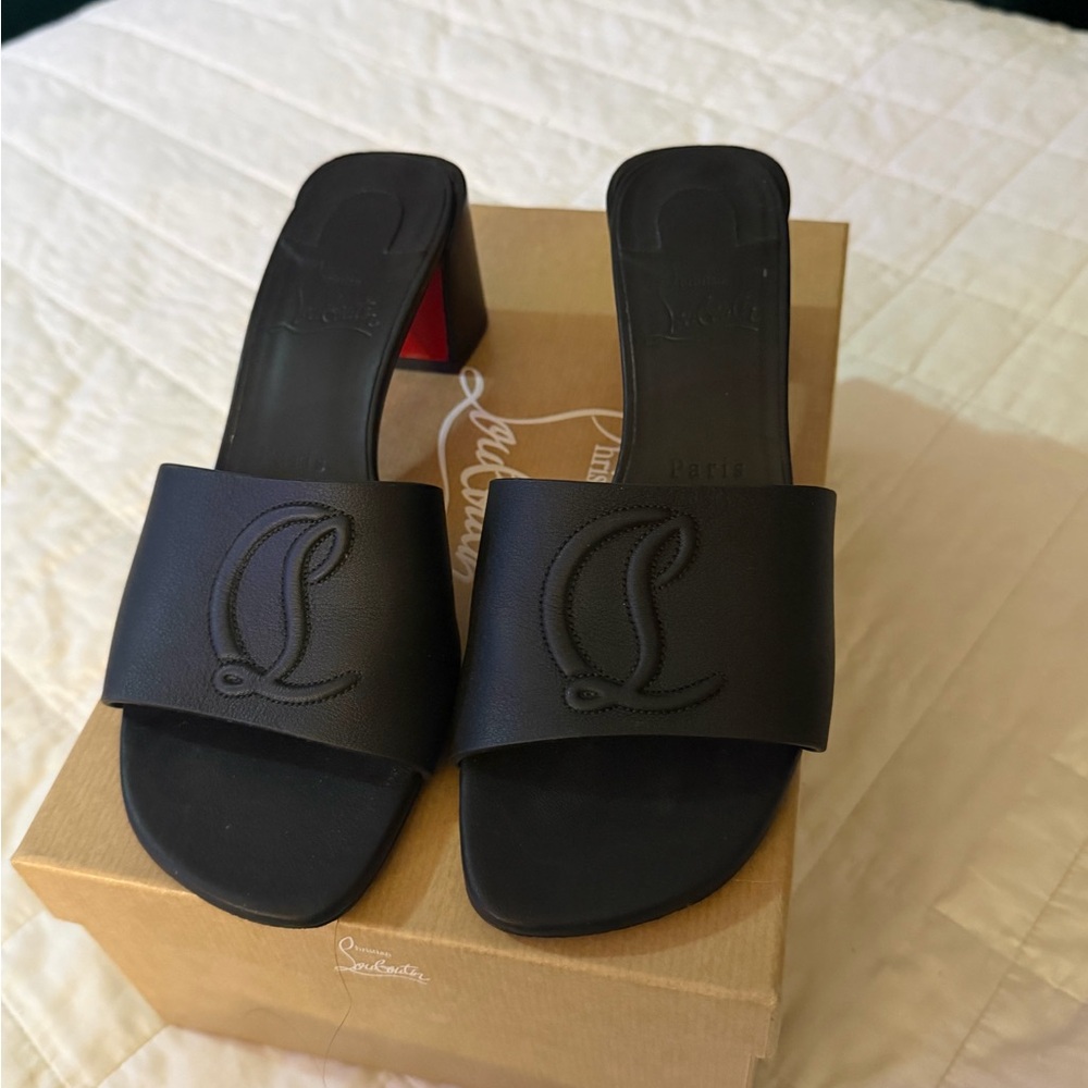 Christian Louboutin Black Mules with Signature Red Sole